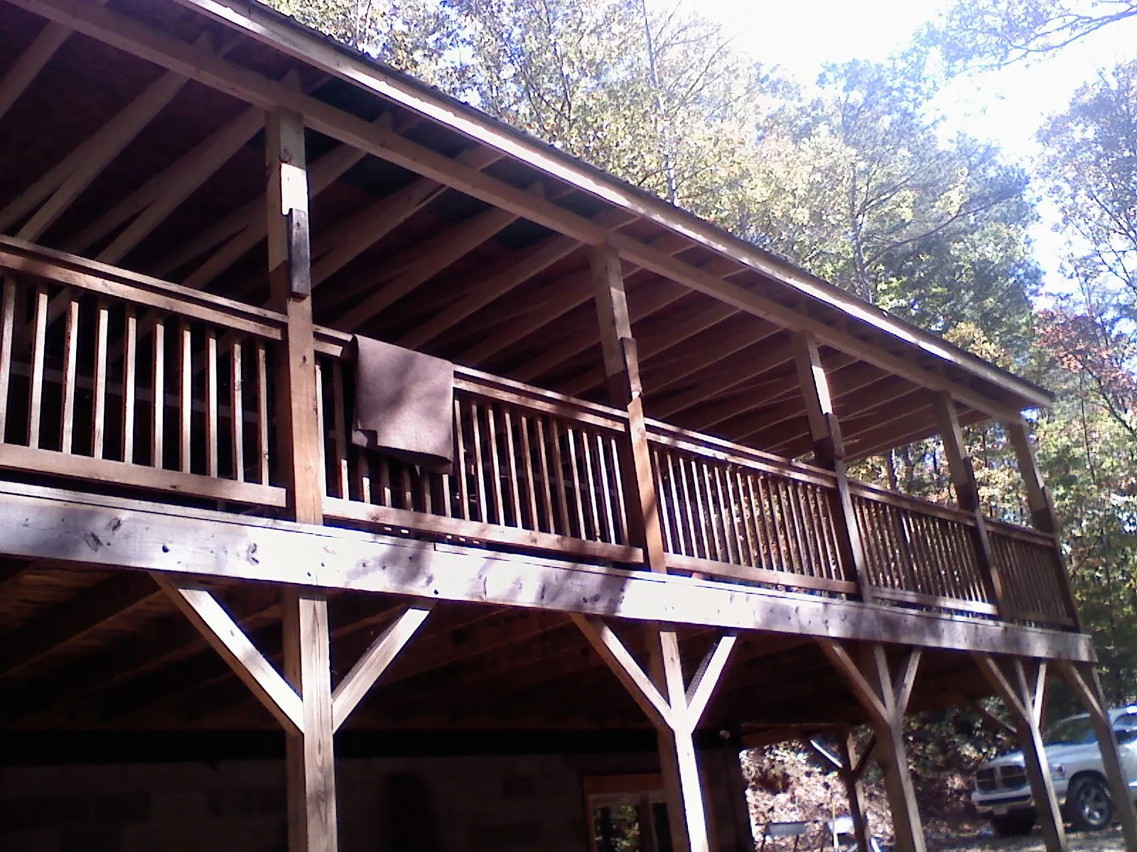 Timber framing under a new elevated porch and deck — Roof Leak Repair in Cowlesville by Roofing Brothers